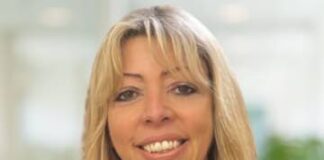 How can professional services firms stop the flow of females leaving before they reach senior leadership positions?